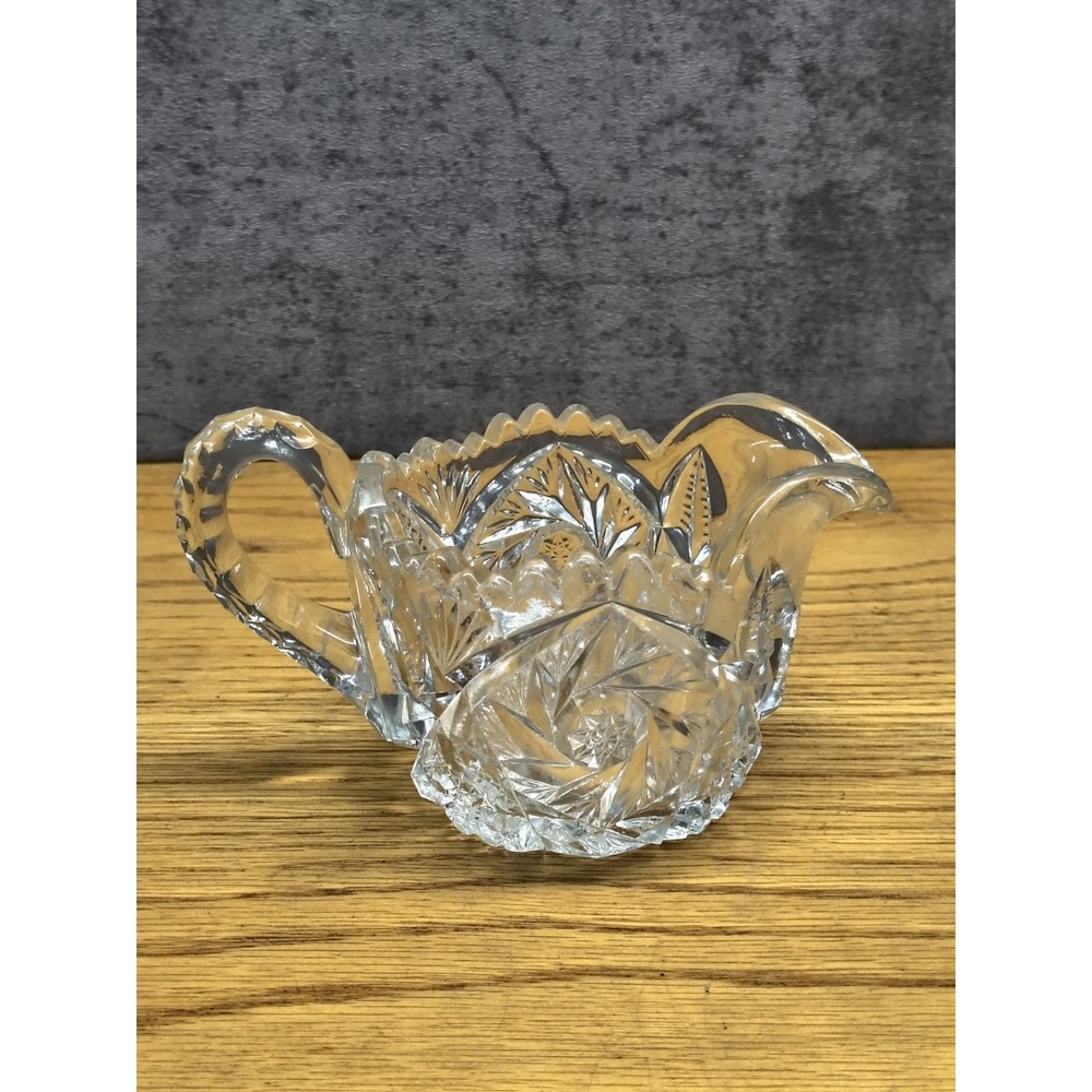 EAPG US Glass Co Clear Artcut Whirling Buzzsaw Hobstar Sawtooth Egde Creamer